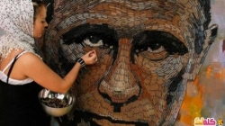فنانة أوكرانية تنجح فى رسم صورة بوتين بإستخدام 5000 رصاصة فارغة