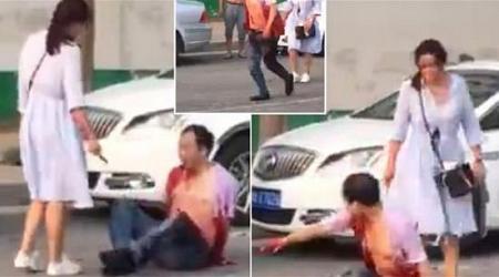 بالفيديو امرأة تطعن زوجها الخائن في الشارع