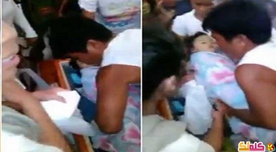 بالفيديو طفلة فلبينية تعود إلى الحياة قبل دفنها