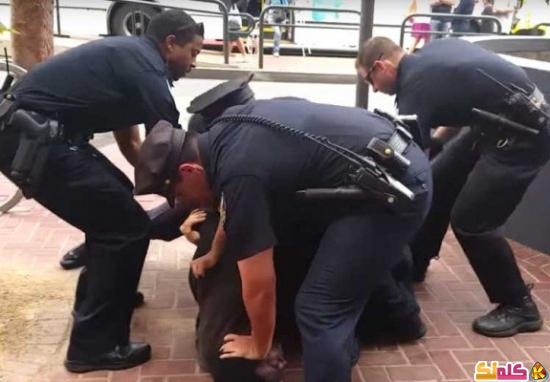 عناصر من الشرطة الأمريكية تعتدى على شاب أسود معاق بوحشية