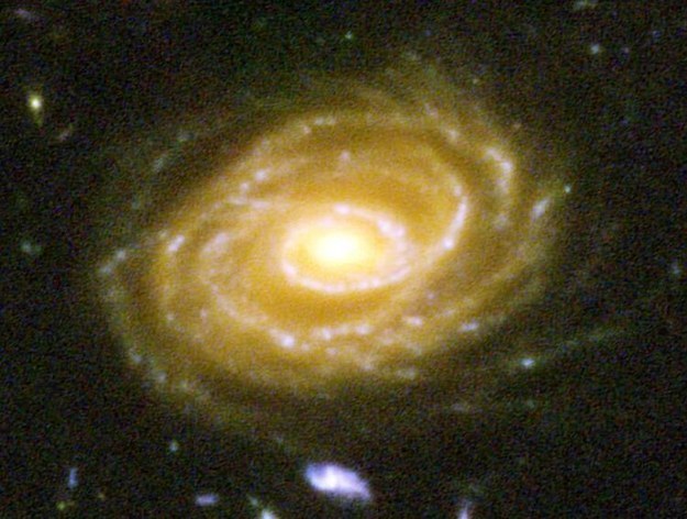 Here&#39;s one of the galaxies pictured, UDF 423. This galaxy is 10 BILLION light years away. When you look at this picture, you are looking billions of years into the past.