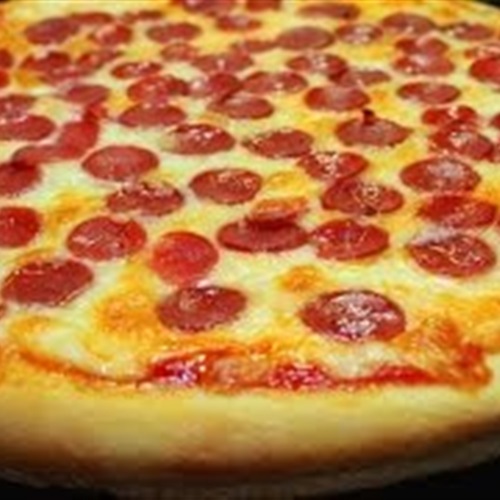 بالفيديو سر عمل عجينة البيتزا الجاهزة
