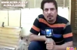 شاهد بالفيديو أسد يعض مذيعا عراقيا على الهواء