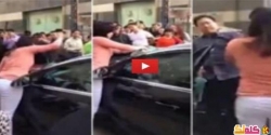 بالفيديو بث فيديو إباحى برفقة رجل انتقام امرأة لخيانة زوجها بعد صفعه وتحطيم سيارته أمام الجميع