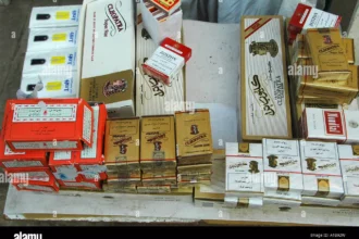 أسعار السجائر اليوم في مصر 2026 بعد تطبيق الزيادة الضريبية.. القائمة الرسمية للمستهلك 13 egyptian cigarettes for sale at the market in cairo egypt A1B92W