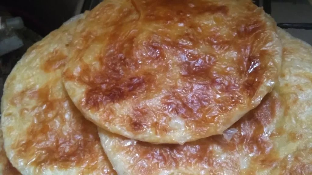 Egyptian feteer meshaltet layered pastry golden