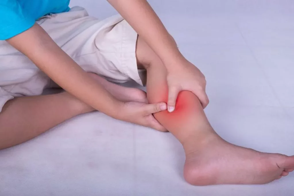 person experiencing leg cramps at night nutrition deficiency concept